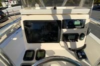 2013 Pathfinder 2200 TRS boat dashboard with Garmin navigation and control systems.
