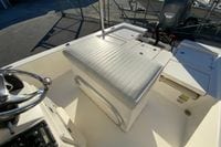 2013 Pathfinder 2200 TRS boat interior with steering wheel and cushioned seating.