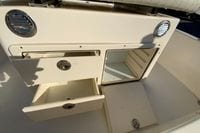 2013 Pathfinder 2200 TRS boat storage compartments with open drawers and hatch.