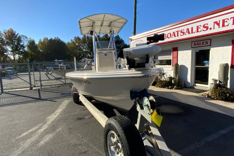 2013 Pathfinder 2200 TRS boat on trailer outside sales office.
