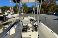 2013 Pathfinder 2200 TRS boat with Garmin navigation, parked outdoors on a sunny day.