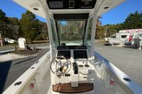 2017 Everglades 253 Center Console boat interior with steering wheel and control panel.