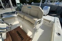 2017 Everglades 253 Center Console boat interior with cushioned seating and steering wheel.