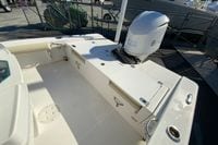 2017 Everglades 253 Center Console boat with Yamaha 300 engine, docked outdoors.
