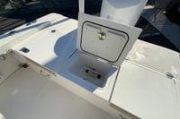 2017 Everglades 253 Center Console boat with open storage compartment and Yamaha branding.