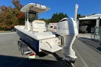 2017 Everglades 253 Center Console boat with Yamaha 300 outboard motor on trailer.