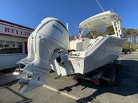 2025 Cobia 280 Dual Console boat with Yamaha engine on a trailer.