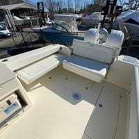 2025 Cobia 280 Dual Console boat interior with seating and storage.