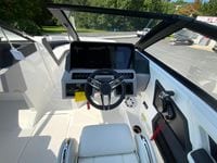 2026 Cobalt R4 OB boat cockpit with modern steering and control panel.
