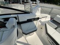 2026 Cobalt R4 OB boat interior with white seating and modern design.