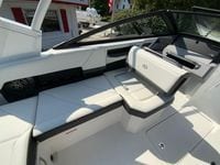 Luxurious interior of 2026 Cobalt R4 OB boat with sleek white seating.