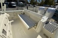 2026 Cobia 265 Center Console boat interior with seating and dual engines.