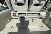 2026 Cobia 265 Center Console boat interior with storage compartments and seating.
