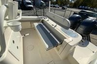2019 Cobia 262 Center Console boat interior with seating and dual engines.