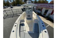 2019 Cobia 262 Center Console boat with Garmin equipment, parked at a sales lot.