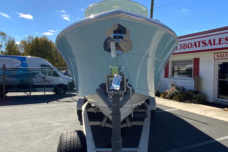 2019 Cobia 262 Center Console boat on trailer at dealership.