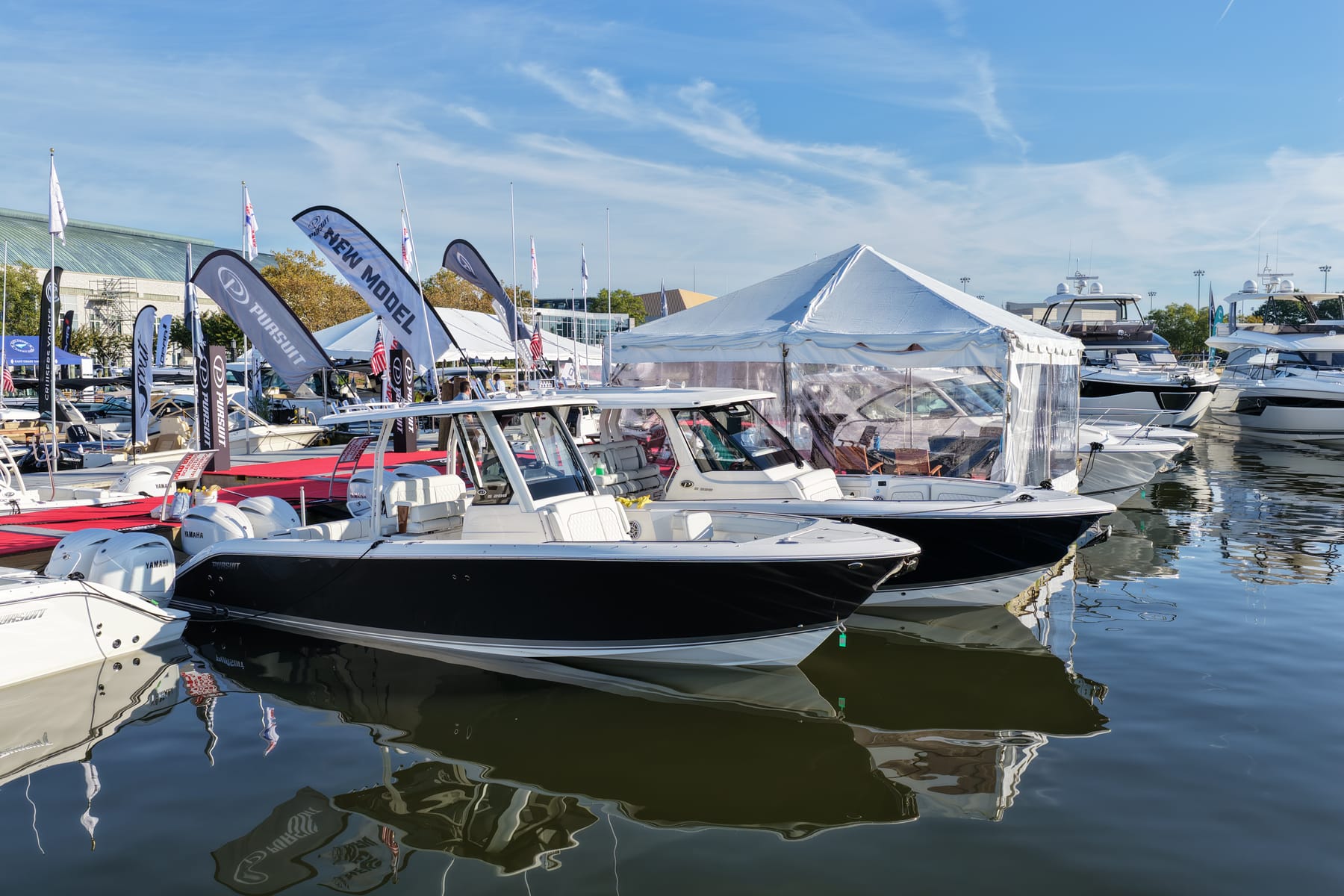 Pursuit boats on the docks at the Annapolis Powerboat Show